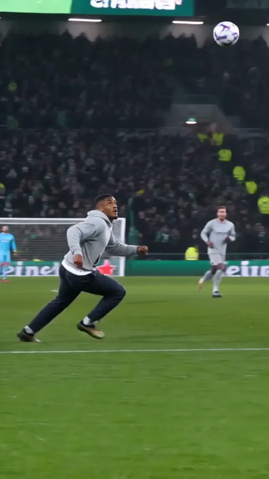 Ozil goal AI video frame: the ball floats over the keeper as he sprints after it